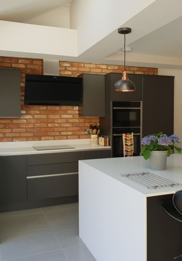 Contemporary Handleless Slab Kitchen designed and installed by Leger Interiors in York 