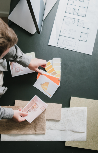 Member of the kitchen designers York team gathering kitchen swatches and inspiration