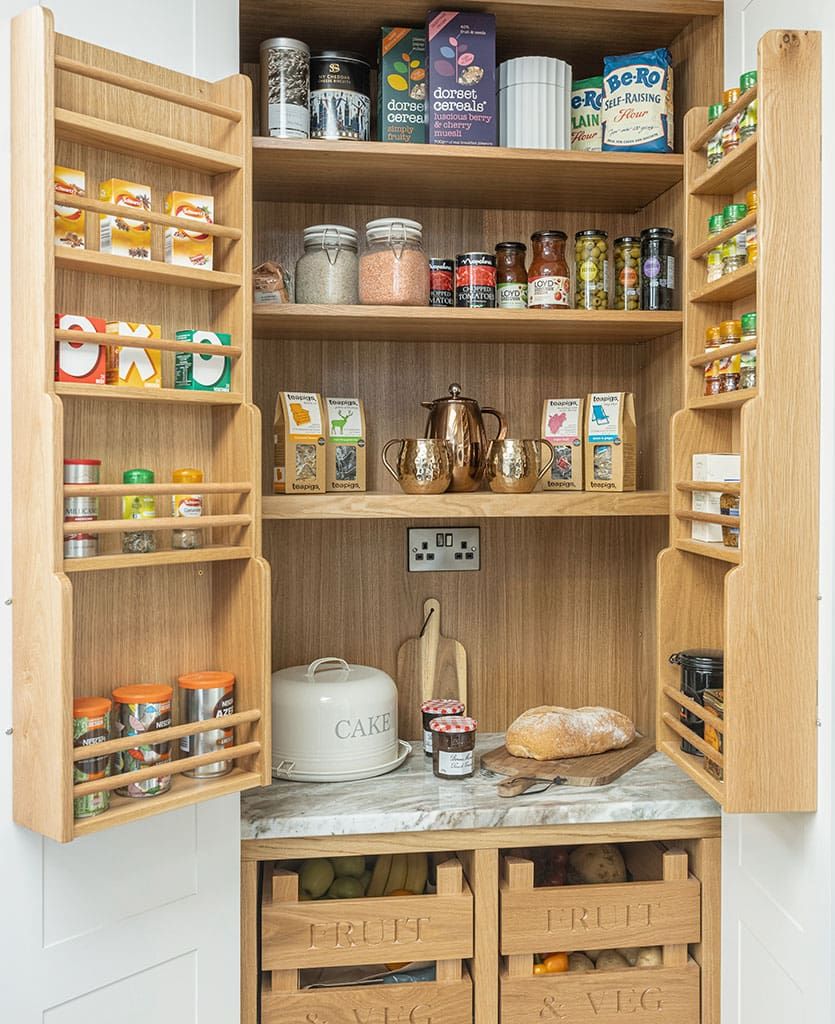 Bespoke larder unit built inside kitchen cupboard by Leger Interiors